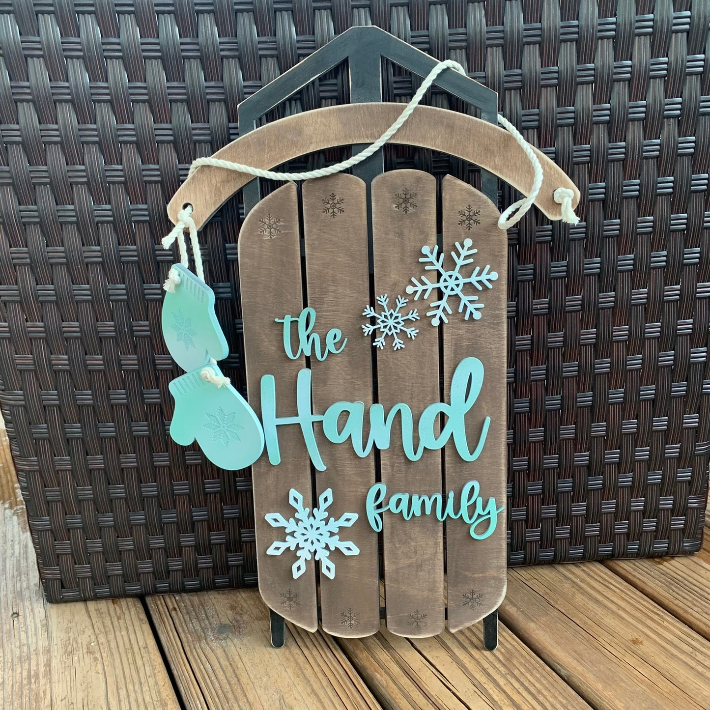 Snowflakes and Mittens Family Name Laser Cut Wood Sled Sign